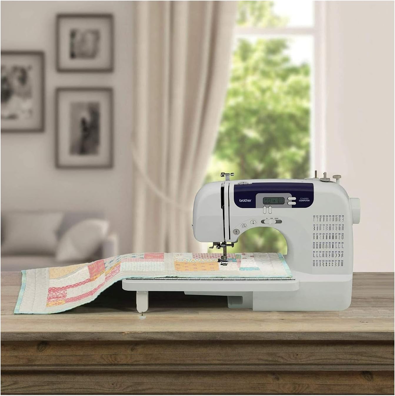 Brother CS7000X Computerized Sewing and Quilting Machine, 70 Built-in Stitches, LCD Display, Wide Table, 10 Included Feet, White